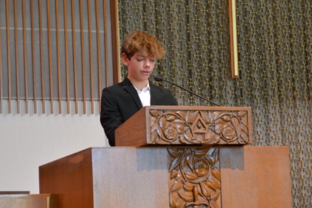 A young mas speaking from the pulpit at Central United Methodist Church in Waterford MI