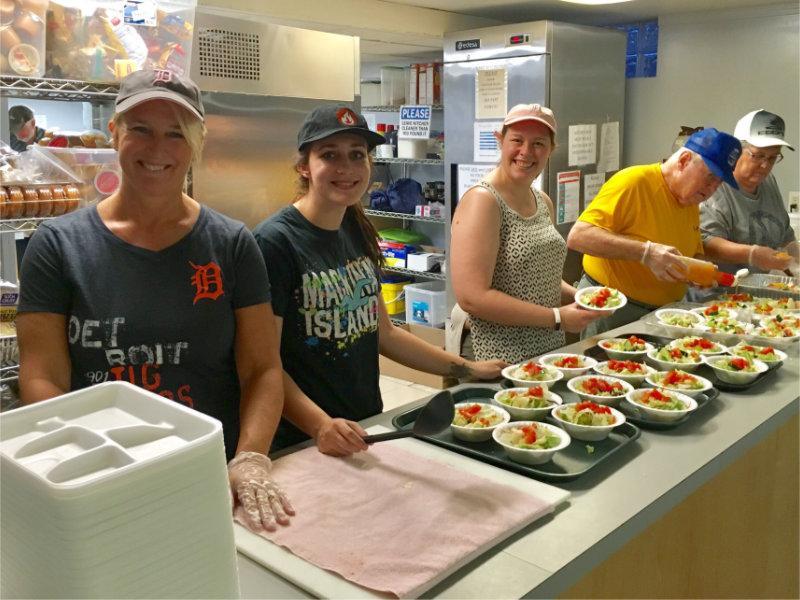 A group of people serving lunch at HOPE Shelter in Pontiac, MI