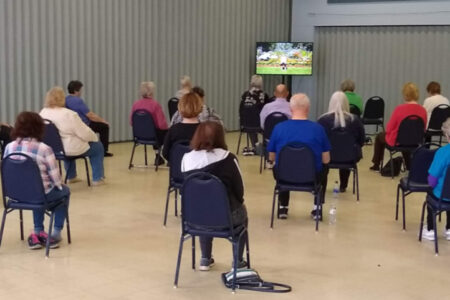 A group of older adults at Central's Easy Chair Exercise class